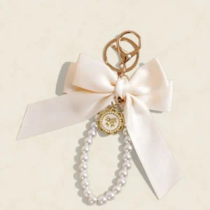 Schlüsselanhänger Schleife mit Perlen Champagner